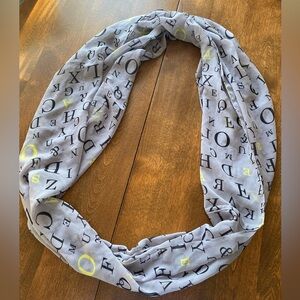 Alphabet Print Scarf - Gray and Yellow. Semi translucent fabric.